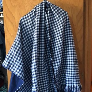 Reversible poncho with arm holes